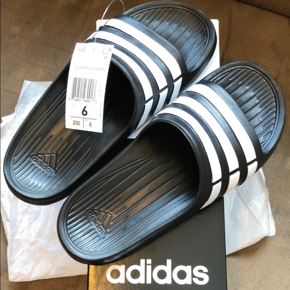 Brand new Adidas Duramo Slide
